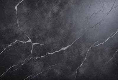The primary subject of the image is a close-up of a marble wall. The setting is a dark room, and the visual style is a black and white photo. The colors and mood of the image are predominantly dark, with the marble wall being the main focus.