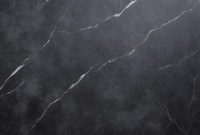 The primary subject of the image is a marble wall with a gray and white color scheme. The setting is a room with a gray and white marble floor. The visual style is a close-up of the marble wall, showcasing its texture and pattern. The colors and mood of the image are predominantly gray and white, giving it a clean and elegant appearance.