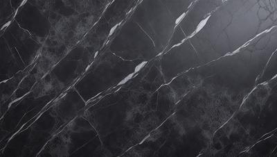 The primary subject of the image is a marble wall with a black background. The setting is a room with a black marble wall, and the visual style is a close-up of the marble wall. The colors and mood of the image are dark and moody, with the black marble wall and the black background creating a dramatic and sophisticated atmosphere.