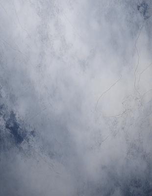 The primary subject of the image is a cloudy sky. The setting is a cloudy day, and the visual style is a photo. The colors and mood of the image are predominantly blue and gray, creating a calm and serene atmosphere.