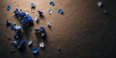 The primary subject of the image is a bouquet of blue flowers, which are scattered across a brown surface. The setting appears to be a natural environment, with the flowers possibly falling from a tree or being blown by the wind. The visual style of the image is a close-up of the flowers, showcasing their beauty and details. The dominant colors in the image are blue and brown, creating a calm and serene atmosphere.