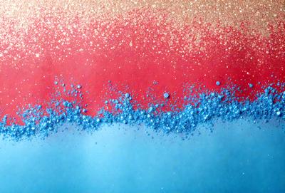 The primary subject of the image is a close-up of a blue and red glittery surface. The setting appears to be a wall or a table with a blue and red pattern. The visual style of the image is a close-up of the glittery surface, which gives it a unique and eye-catching appearance. The dominant colors in the image are blue and red, creating a vibrant and lively atmosphere.