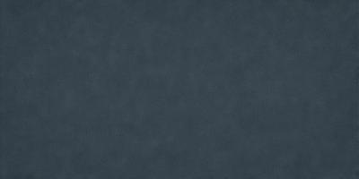 The primary subject of the image is a large, dark blue surface. The setting is a dark, empty room with no visible objects or people. The visual style is a close-up of the blue surface, which appears to be a fabric or a wall. The colors and mood of the image are predominantly dark and moody, with the blue surface being the main focus of the image.