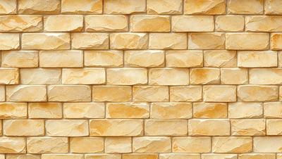 The primary subject of the image is a brick wall, which is the main object, scene, or focus of the image. The setting/background consists of a yellow brick wall, which is the visible environment, backdrop, or surface. The visual style of the image is a photo, as it is a real-life brick wall. The colors and mood of the image are predominantly yellow, giving it a warm and inviting atmosphere.