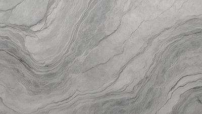 The image features a gray marble countertop with a unique, textured design. The countertop appears to be made of stone, giving it a natural and elegant appearance. The surface is smooth and free of any visible imperfections, making it an attractive and functional choice for a kitchen or bathroom counter.
