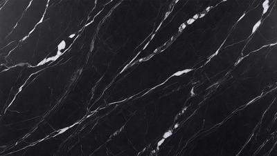 The primary subject of the image is a marble countertop with a black background. The countertop features a pattern of white and black swirls, giving it a unique and elegant appearance. The visual style of the image is a close-up of the marble countertop, showcasing its intricate design. The colors and mood of the image are predominantly black and white, creating a sophisticated and timeless atmosphere.
