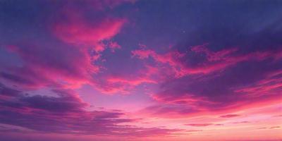 The primary subject of the image is a beautiful pink sky with clouds. The setting is a cloudy sky, and the visual style is a photo. The dominant colors are pink and purple, creating a warm and serene atmosphere.
