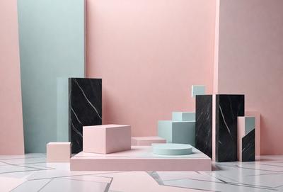 The primary subject of the image is a collection of variously shaped and colored blocks, including pink, blue, and black, arranged on a pink surface. The setting appears to be a studio or workspace, with a wall in the background. The visual style of the image is a combination of photo and digital art, creating a unique and artistic composition. The colors and mood of the image are vibrant and lively, with the pink and blue blocks adding a sense of playfulness and creativity to the