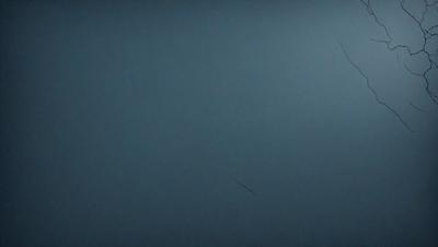 The primary subject of the image is a blue wall with a few white lines on it. The setting is a room with a blue background. The visual style is a close-up of the wall, and the colors and mood are predominantly blue and calm.
