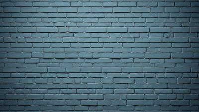 The primary subject of the image is a blue brick wall. The setting is a brick wall, and the visual style is a photo. The dominant colors are blue and white, creating a calm and serene atmosphere.