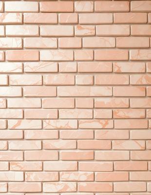The primary subject of the image is a brick wall. The setting is a brick wall with a pinkish hue, possibly made of marble. The visual style is a close-up of the brick wall, showcasing its texture and pattern. The colors and mood of the image are predominantly pink, giving it a warm and inviting atmosphere.