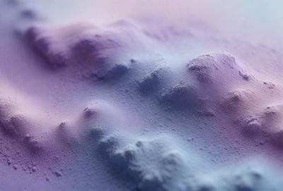 The primary subject of the image is a mountainous terrain with a purple and blue color scheme. The setting is a mountainous landscape, and the visual style appears to be a digital art or illustration. The dominant colors are purple and blue, creating a serene and calming atmosphere.