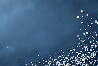 The primary subject of the image is a large number of white pills, which are scattered throughout the scene. The setting is a blue background, which creates a contrasting and visually appealing effect. The visual style of the image is a combination of a photo and digital art, as it appears to be a close-up of the pills against a blue background. The colors and mood of the image are predominantly white and blue, giving it a clean and soothing atmosphere.