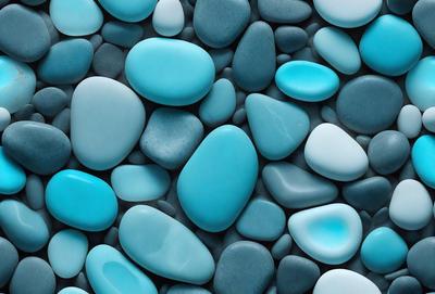 The primary subject of the image is a large collection of blue rocks, which are arranged in a visually appealing manner. The setting is a blue background, which complements the blue rocks and adds to the overall visual style. The image is a photo, showcasing the natural beauty of the rocks and their unique arrangement. The dominant colors in the image are blue, creating a calm and serene atmosphere.