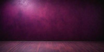The primary subject of the image is a purple wall. The setting is a room with a wooden floor. The visual style is a photo, and the dominant colors are purple and brown. The overall atmosphere is calm and serene.