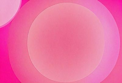 The primary subject of the image is a pink circle, which is the main object, scene, or focus of the image. The setting or background of the image is a pink surface, which adds to the overall atmosphere and visual style of the image. The colors and mood of the image are predominantly pink, creating a warm and inviting atmosphere.