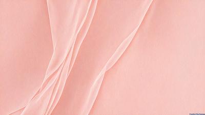 The primary subject of the image is a pink fabric, which is the main object, scene, or focus of the image. The setting or background is a pink surface, which adds to the overall atmosphere of the image. The visual style of the image is a close-up of the pink fabric, showcasing its texture and pattern. The colors and mood of the image are predominantly pink, creating a warm and inviting atmosphere.