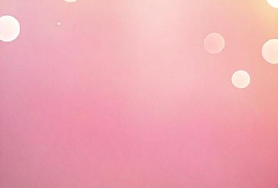 The primary subject of the image is a pink background with a few white bubbles scattered across it. The setting appears to be a pink wall, and the visual style is a close-up of the pink wall. The colors and mood of the image are predominantly pink, creating a warm and inviting atmosphere.