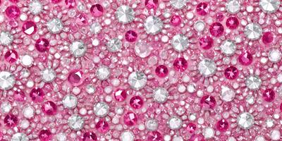 The primary subject of the image is a close-up of a pink background with a pattern of pink and white beads. The setting is a pink background, and the visual style appears to be a close-up of the beads. The colors and mood of the image are predominantly pink, creating a warm and inviting atmosphere.
