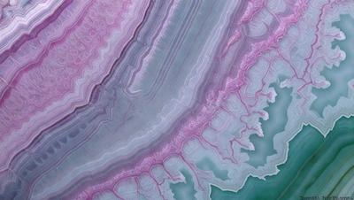 The primary subject of the image is a close-up of a purple and pink rock formation. The setting is a natural environment, with the rock formation as the main focus. The visual style is a combination of photo and digital art, creating a unique and intricate pattern. The dominant colors in the image are purple and pink, giving the scene a vibrant and lively atmosphere.