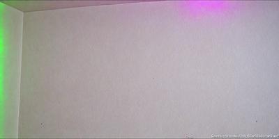 The image features a large, blank piece of paper with a pink glow. The paper appears to be white, and the pink glow adds a unique and visually appealing touch to the scene. The primary subject of the image is the blank paper, which is the central focus of the image. The setting is a simple, minimalistic background, with no additional objects or distractions. The visual style of the image is a combination of a photo and a digital art, as the pink glow and the paper's