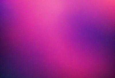 The primary subject of the image is a pink background. The setting is a purple background, which creates a contrasting and visually appealing effect. The visual style of the image is a close-up of the pink background, showcasing its vibrant color. The colors and mood of the image are predominantly pink and purple, giving it a warm and inviting atmosphere.