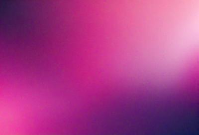 The primary subject of the image is a pink background. The setting is a purple background, which creates a contrasting effect. The visual style is a close-up of the pink background, emphasizing its vibrant color. The colors and mood of the image are predominantly pink and purple, giving it a warm and inviting atmosphere.