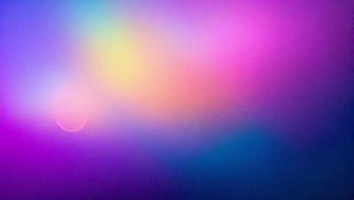 The primary subject of the image is a colorful, swirling pattern that resembles a rainbow. The setting is a purple background, which adds to the vibrant and lively atmosphere of the scene. The visual style of the image is a combination of photo and digital art, creating a unique and eye-catching effect. The dominant colors in the image are purple, pink, and blue, which contribute to the overall mood of the scene, evoking feelings of joy and creativity.