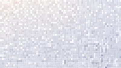 The primary subject of the image is a white tile wall with a pattern of white squares. The setting is a room with a white tile wall as the main focus. The visual style is a pattern of white squares, giving the wall a clean and organized appearance. The colors and mood of the image are predominantly white, creating a calm and serene atmosphere.