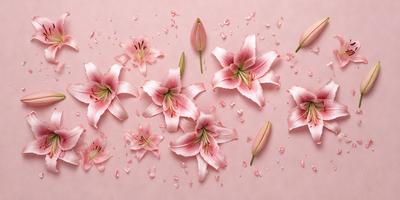 The primary subject of the image is a bouquet of pink flowers, which are scattered across a pink background. The flowers are arranged in various positions, creating a visually appealing scene. The setting appears to be a pink surface, which adds to the overall mood of the image. The visual style of the image is a close-up of the flowers, showcasing their details and beauty. The colors and mood of the image are predominantly pink, creating a warm and inviting atmosphere.