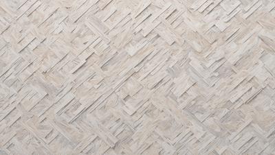 The primary subject of the image is a wall with a unique and intricate design. The wall features a pattern of interlocking squares, giving it a textured and visually interesting appearance. The setting is indoors, likely in a room or a space with a similar design. The visual style of the image is a close-up of the wall, showcasing the intricate pattern and details of the design. The colors and mood of the image are predominantly neutral, with the interlocking squares providing a sense of