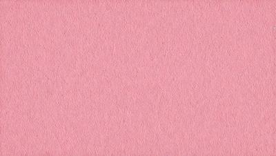 The primary subject of the image is a pink surface, which appears to be a piece of fabric or a wall. The setting is a room with a pink background, and the visual style is a close-up of the pink surface. The colors and mood of the image are predominantly pink, creating a warm and inviting atmosphere.