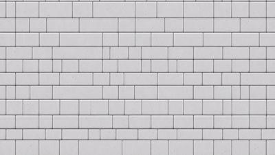The primary subject of the image is a large brick wall. The setting is a brick wall, and the visual style is a photo. The colors and mood of the image are predominantly gray, giving it a somewhat dull and monotonous appearance.