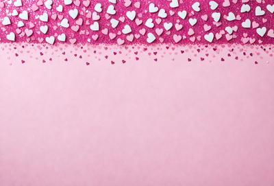 The primary subject of the image is a pink background with a pattern of hearts. The hearts are scattered across the background, creating a visually appealing and heartwarming scene. The setting appears to be a pink wall or a similar surface, which complements the hearts' pattern. The visual style of the image is a combination of digital art and illustration, as the hearts are arranged in a visually pleasing manner. The colors and mood of the image are predominantly pink, which evokes feelings of warm