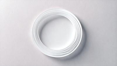 The primary subject of the image is a white plate with a circular hole in the center. The plate is placed on a white surface, which could be a table or a wall. The visual style of the image is a close-up, focusing on the plate and its hole. The colors in the image are predominantly white, giving it a clean and minimalist appearance. The overall mood of the image is simple and uncluttered.
