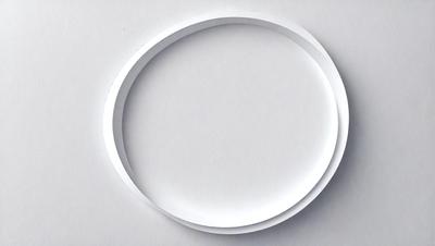 The primary subject of the image is a white circle, which is the main object, scene, or focus of the image. The setting is a white background, which provides a clean and minimalist environment for the circle. The visual style is a photo, as the image is a close-up of the white circle. The colors and mood of the image are predominantly white, giving it a clean and simple appearance.