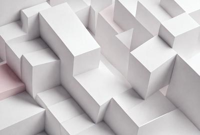The primary subject of the image is a white, three-dimensional structure, which appears to be a white cube or a white box. The setting is a white background, which creates a clean and minimalist appearance. The visual style is a close-up of the white structure, emphasizing its details and texture. The colors and mood of the image are predominantly white, giving it a calm and serene atmosphere.