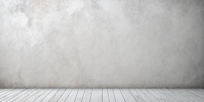 The primary subject of the image is a white wall with a large, empty space. The setting is a room with a white floor, and the visual style is a photo. The colors and mood of the image are predominantly white, giving it a clean and minimalist appearance.