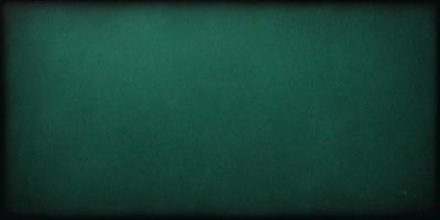 The primary subject of the image is a green cloth, which serves as the background. The setting is a dark room, and the visual style appears to be a photo. The dominant colors are green and black, creating a calm and serene atmosphere.
