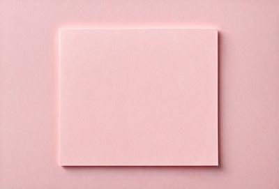 The primary subject of the image is a pink cardboard, which is the main object in the scene. The setting is a pink background, which complements the color of the cardboard. The visual style is a photo, capturing the pink cardboard in its natural environment. The colors and mood of the image are predominantly pink, creating a warm and inviting atmosphere.