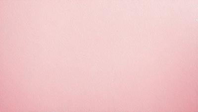 The primary subject of the image is a pink background. The setting is a blank, unblemished surface, which gives the impression of a clean and untouched environment. The visual style is a close-up of the pink background, showcasing its color and texture. The colors and mood of the image are predominantly pink, creating a warm and inviting atmosphere.
