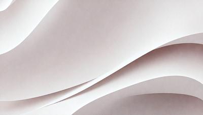 The primary subject of the image is a large sheet of white paper. The setting is a room with a wall, and the visual style is a close-up of the paper. The colors and mood of the image are predominantly white, giving it a clean and minimalist appearance.