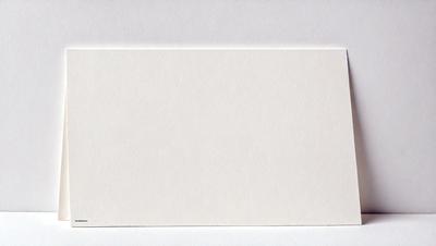 The primary subject of the image is a white piece of paper. The setting is a white background, which creates a clean and minimalist appearance. The visual style is a simple, straightforward representation of the paper. The colors and mood are predominantly white, giving the image a calm and uncluttered feel.