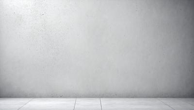 The primary subject of the image is a person standing in front of a white wall. The setting is a room with a concrete wall, and the visual style is a photo. The colors in the image are predominantly white, giving it a clean and minimalist appearance. The mood of the image is calm and focused, as the person is standing alone in the room.