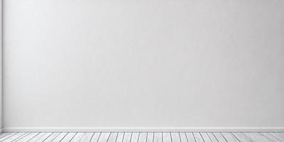 The primary subject of the image is a white wall with a wooden floor. The setting is a room with a white wall, and the visual style is a photo. The colors and mood of the image are predominantly white, creating a clean and minimalist atmosphere.