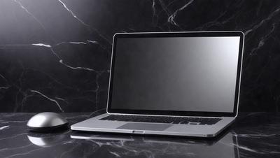 The primary subject of the image is a laptop computer. The laptop is placed on a black marble countertop, which serves as the setting for the scene. The visual style of the image is a photo, capturing the laptop in its natural environment. The colors and mood of the image are dark and moody, with the black marble countertop and the laptop's screen creating a sense of sophistication and elegance.
