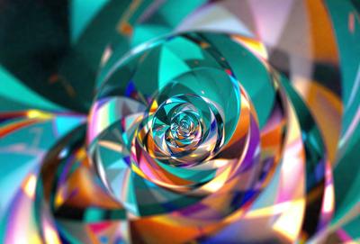 The primary subject of the image is a colorful spiral pattern, which appears to be a digital art or illustration. The spiral is set against a backdrop of a colorful, swirling pattern, creating a vibrant and lively atmosphere. The visual style of the image suggests that it is a creative and artistic representation of a spiral, possibly inspired by nature or abstract art. The colors and mood of the image are predominantly bright and cheerful, with a sense of movement and dynamism.