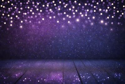 The primary subject of the image is a purple and blue light show, with a purple background and a blue light show. The setting is a stage with a wooden floor. The visual style is a combination of digital art and illustration, creating a vibrant and colorful atmosphere. The dominant colors are purple and blue, giving the scene a unique and captivating mood.