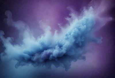 The primary subject of the image is a purple and blue cloud, which is the main object, scene, or focus of the image. The setting or background features a purple and blue sky, which adds to the overall atmosphere of the image. The visual style of the image is a digital art or illustration, as it appears to be a computer-generated or digitally created piece. The colors and mood of the image are predominantly purple and blue, creating a sense of calmness and tranquility.