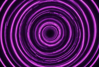 The primary subject of the image is a purple spiral, which appears to be a neon light or a purple circle. The setting is a dark background, which contrasts with the purple spiral. The visual style is a close-up of the spiral, emphasizing its shape and color. The colors and mood of the image are predominantly purple, creating a unique and visually striking scene.